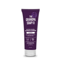 A purple tube of Witch Hazel Conditioner labeled Clarify, infused with witch hazel to replenish moisture and add body. It's vegan, cruelty-free, and suitable for all hair types.